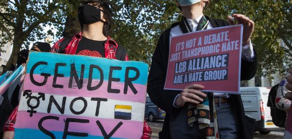 Activists protest outside the first annual LGB Alliance conference