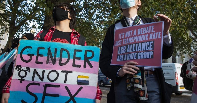 Activists protest outside the first annual LGB Alliance conference