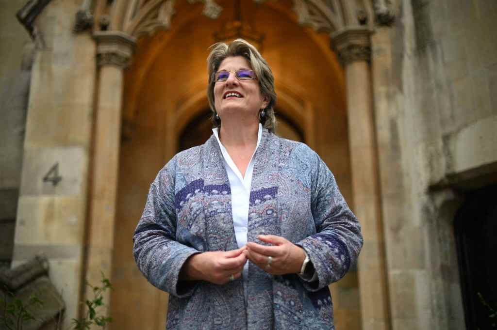Jayne Ozanne poses for a portrait near Westminster Abbey