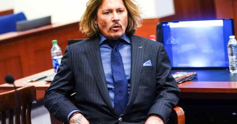 Johnny Depp sits in the courtroom during his defamation trial against Amber Heard