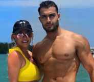 Sam Asghari and Britney Spears pose by the sea