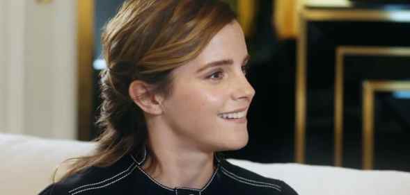 Emma Watson smiles while being interviewed