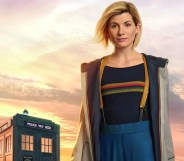 Jodie Whittaker as The Doctor, with a TARDIS in the background
