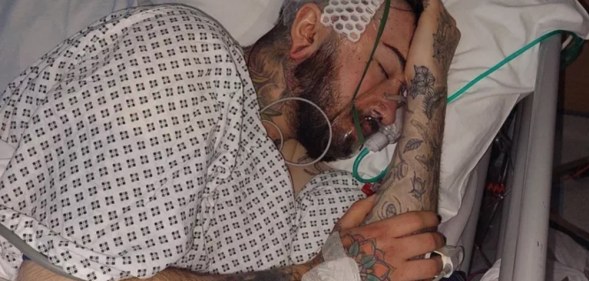 Morgan Fevre lying in a hospital bed