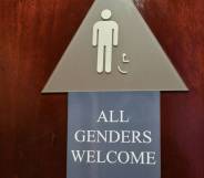 A bathroom sign with a smaller sign that reads "All genders welcome"