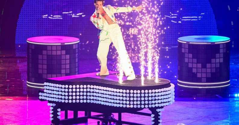 Mika performs during an interlude at the final of the Eurovision Song contest 2022 on May 14, 2022.