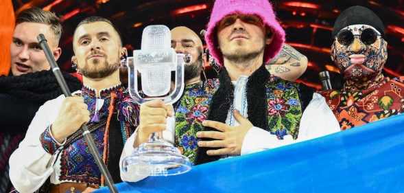 Ukraine's Kalush Orchestra pose with their Eurovision trophy
