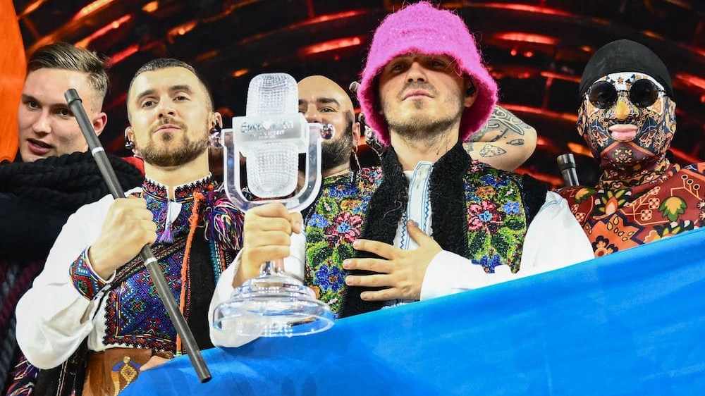 Ukraine's Kalush Orchestra pose with their Eurovision trophy