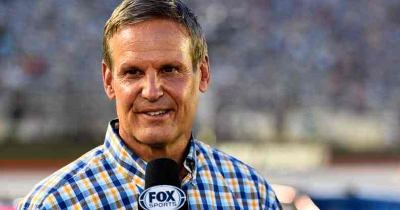 Tennessee governor Bill Lee speaks into a microphone during a sporting event