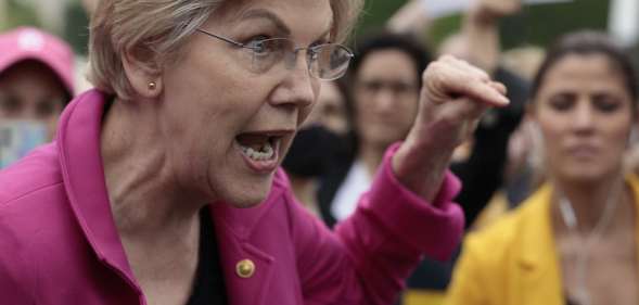 Senator Elizabeth Warren speaks to protesters outside the US Supreme Court