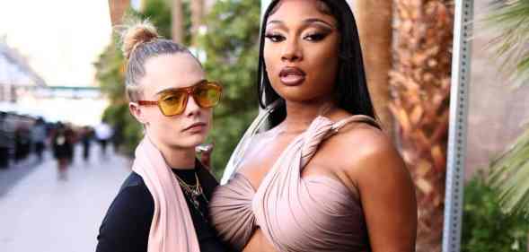 Cara Delevingne and Megan Thee Stallion pose together for a photograph during the Billboard Music Awards
