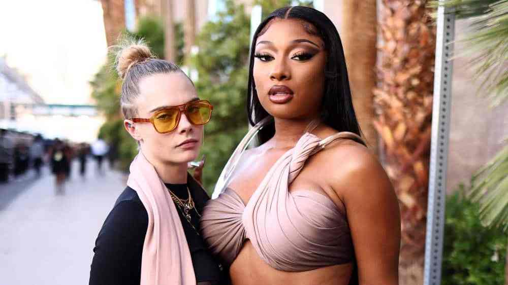 Cara Delevingne and Megan Thee Stallion pose together for a photograph during the Billboard Music Awards