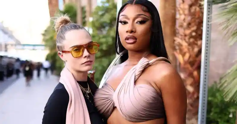 Cara Delevingne and Megan Thee Stallion pose together for a photograph during the Billboard Music Awards