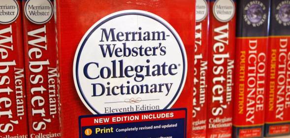 A picture of Merriam-Webster dictionary on a shelf