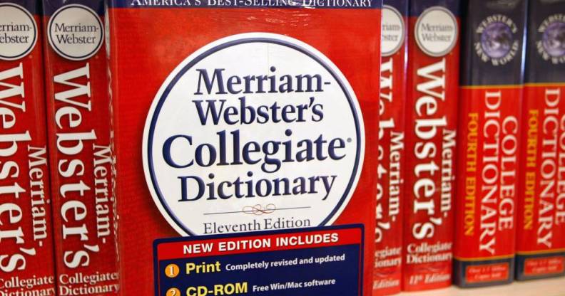 A picture of Merriam-Webster dictionary on a shelf