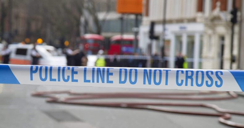 Police tape across a road