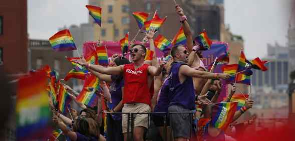Revellers take part in a New York Pride parade