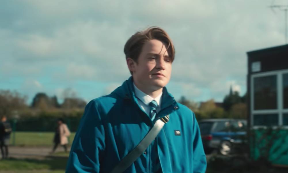 A still from Netflix's Heartstopper which shows Kit Connor as Nick Nelson
