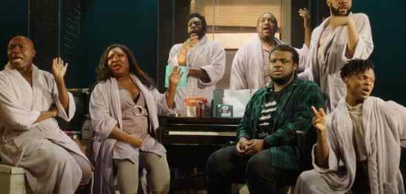 The cast of A Strange Loop perform on stage