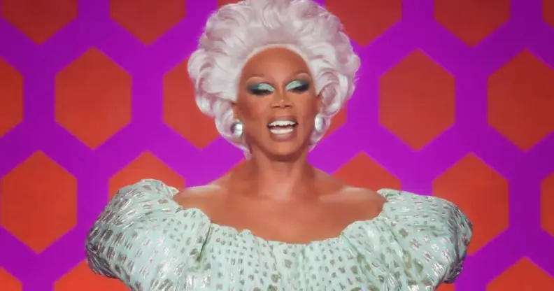 RuPaul laughs while on the judges panel for Drag Race All Stars 7