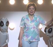 Kate McKinnon's character Colleen Rafferty bids farewell to Earth as she boards an alien spaceship on Saturday Night Live