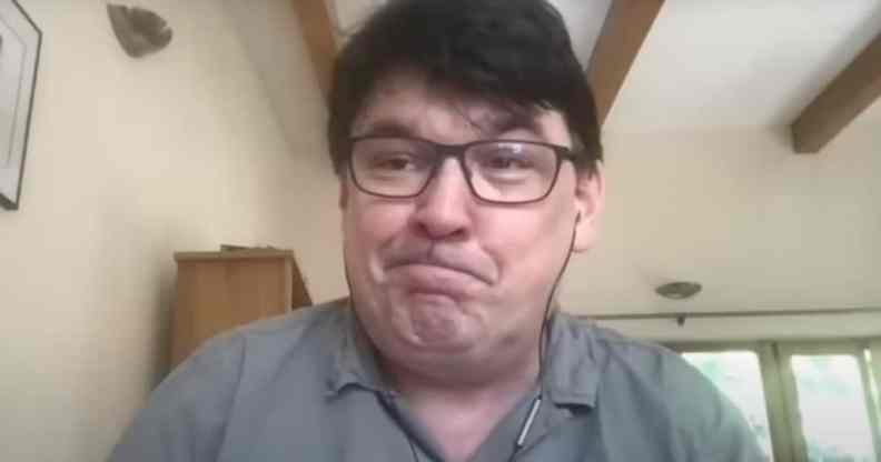 Graham Linehan tears up as he speaks to a webcam