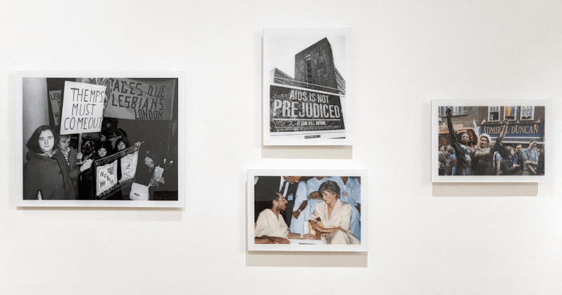 Four photos on a wall in Queer Britain, showing protestors, the Admiral Duncan LGBT+ pub, and Princess Diana meeting AIDS patients