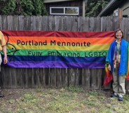 Members of the LGBTQ-inclusive Portland Mennonite Church with a Pride flag