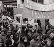 Members of the Gay Liberation Front marching in a historic picture.