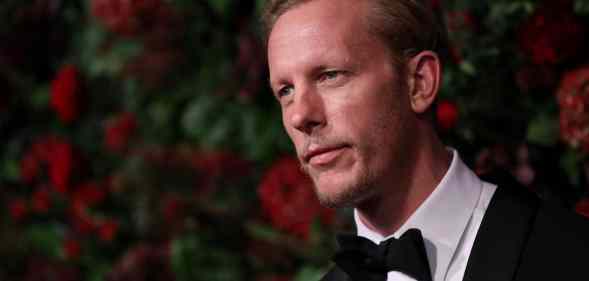 Laurence Fox posing for the 65th Evening Standard Theatre Awards