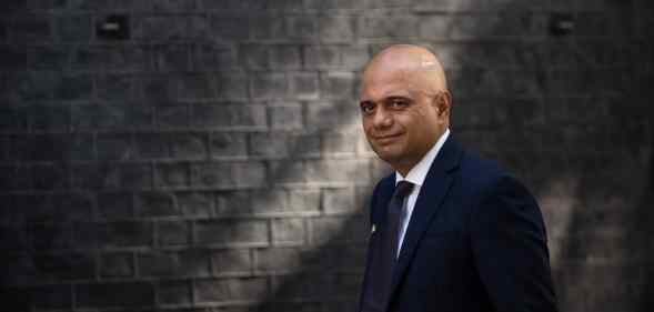 Sajid Javid walks towards Downing Street