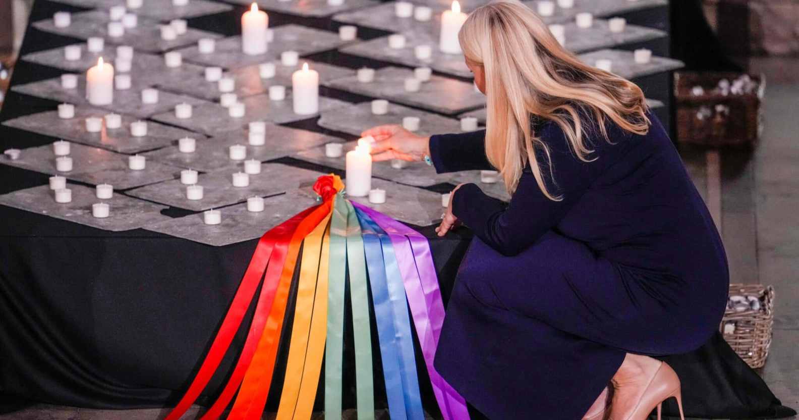 Norwegian crown princess Mette-Marit lit a candle to pay tribute to the victims.