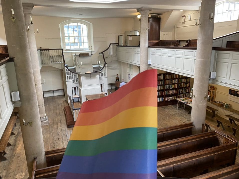 A Pride flag inside John Wesley's New Room