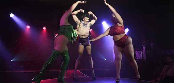 Drag performers on stage