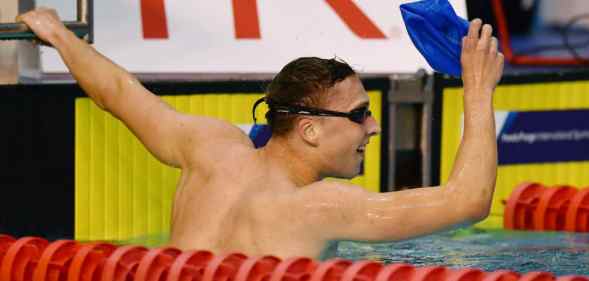 Dan Jervis celebrates winning the men's open 1500m freestyle at the British Swimming Championships 2017