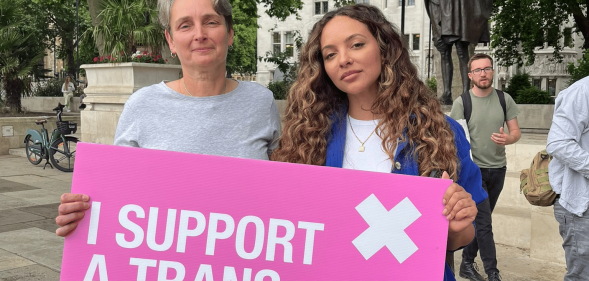 Singer Jade Thirlwall with Labour MP Kate Osborne holding a pink sign that reads: I support a trans-inclusive conversion therapy ban