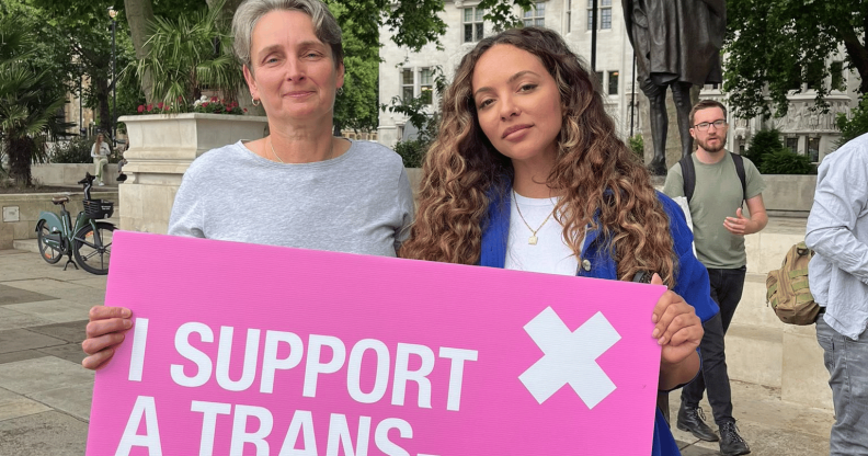 Singer Jade Thirlwall with Labour MP Kate Osborne holding a pink sign that reads: I support a trans-inclusive conversion therapy ban