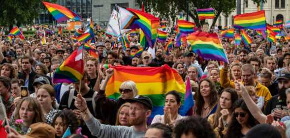 Crowds cheer as speeches are held in front of the Oslo City Hall