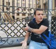 Avaz Hafizli chained to the gate of Azerbaijan's Prosecutor General’s Office