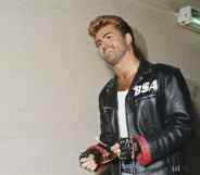 George Michael (1963-2016) pictured wearing a leather jacket with BSA logo backstage during the Japanese/Australasian leg of his Faith World Tour.