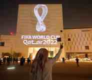 Fifa World Cup 2022 logo being projected on a building in Qatar