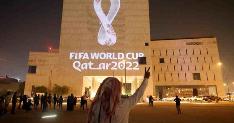 Fifa World Cup 2022 logo being projected on a building in Qatar