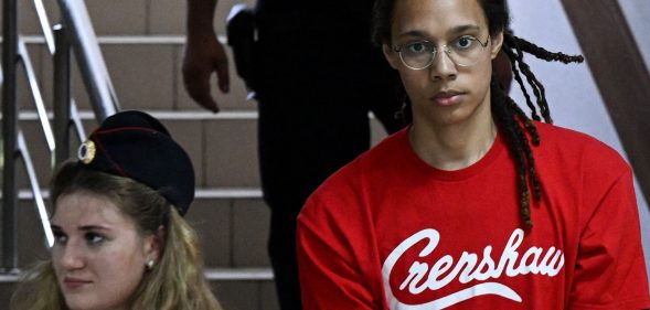 Brittney Griner walks to the court