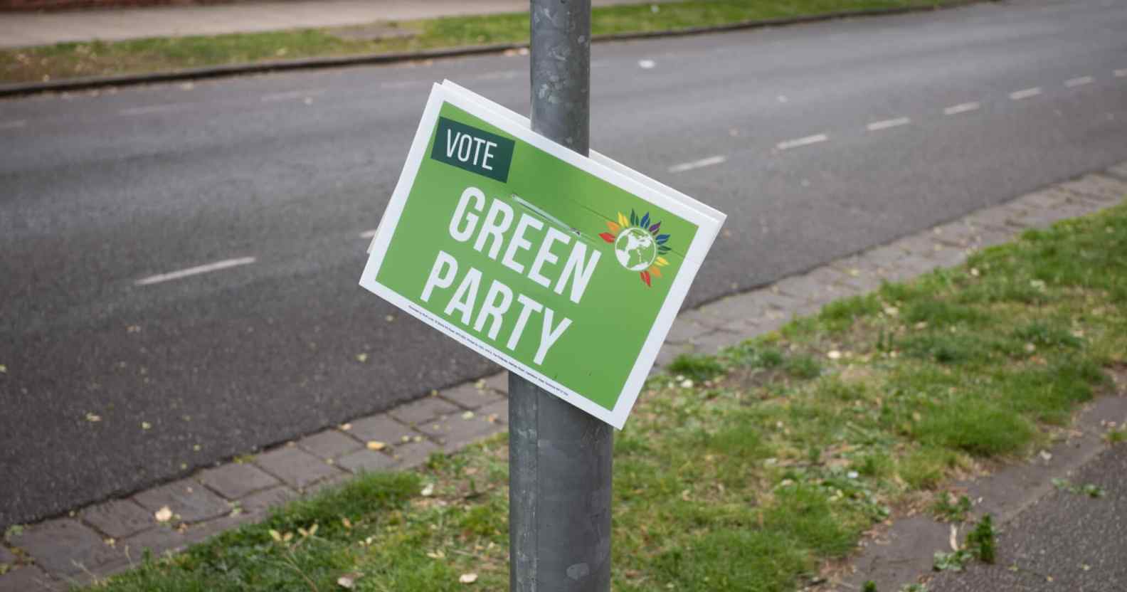 A placard promoting the Green Party hangs from a lamppost ahead of the by-election on June 18, 2022 in Wakefield, England.