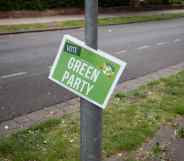 A placard promoting the Green Party hangs from a lamppost ahead of the by-election on June 18, 2022 in Wakefield, England.