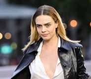 Cara Delevingne goes topless for Vogue and says 'it's all of our jobs' to fight for human rights