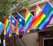 A gay US flag, USA Rainbow flag, US gay pride flag is proudly displayed in the city of Houston, Texas