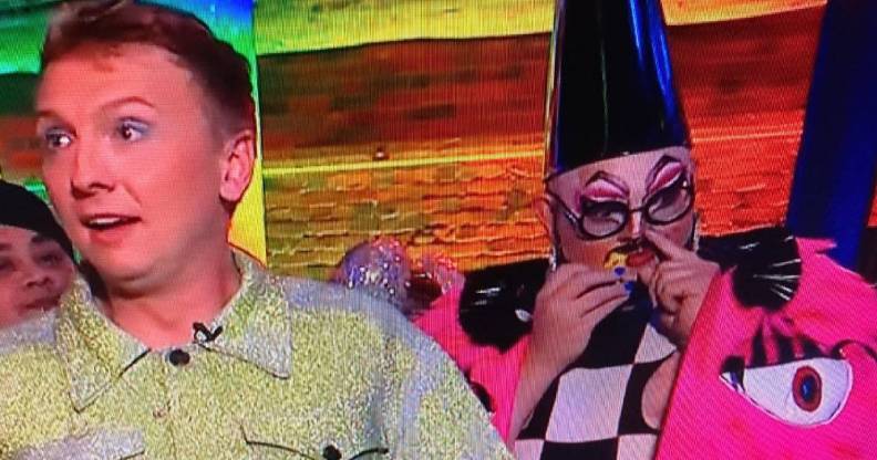 Drag queen Fatt Butcher wears a pink, black and white outfit as they sniff poppers during Joe Lycett's Big Pride Party on Channel 4