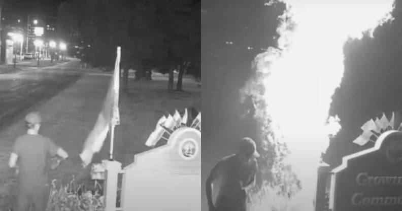 A man wearing a ball cap and t-shirt is seen in two black-and-white screenshots taken from trail camera footage setting a LGBTQ+ Pride flag, which was displayed next to a sign outside Lansing, Michigan, on fire