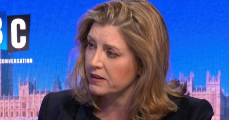 Penny Mordaunt wears a dark outfit as she talks to someone off screen during an interview on LBC